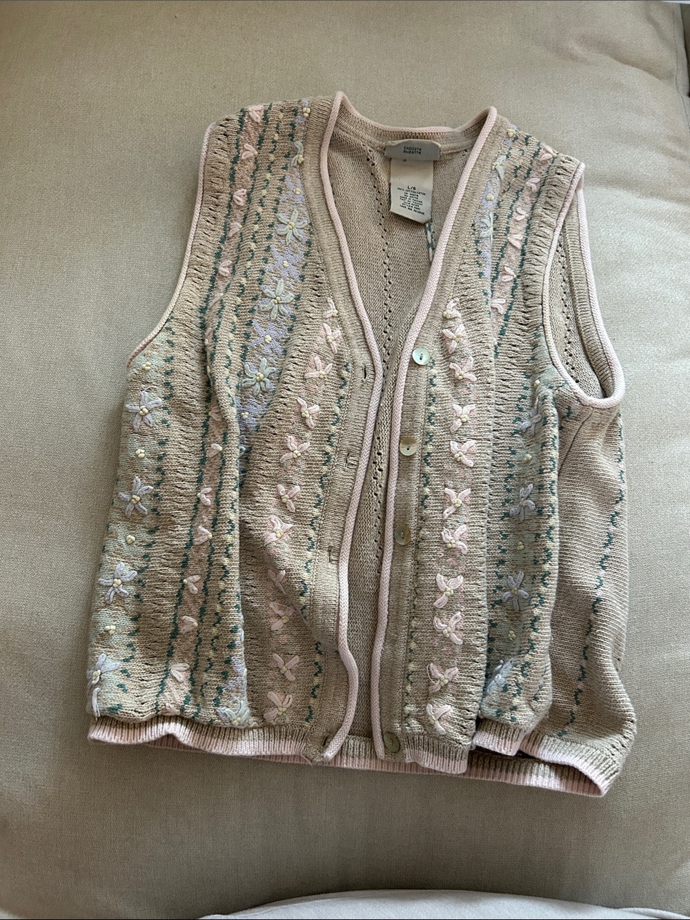 Beige sweater vest
